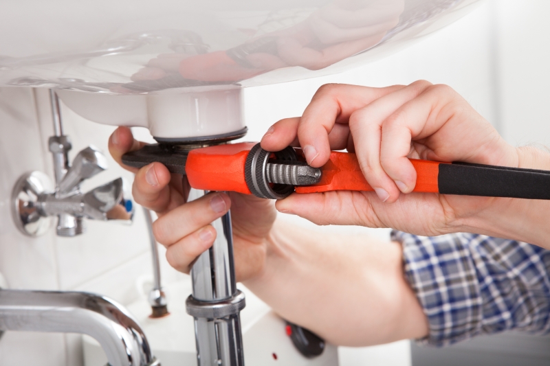 Emergency plumber attending a job in Battersea