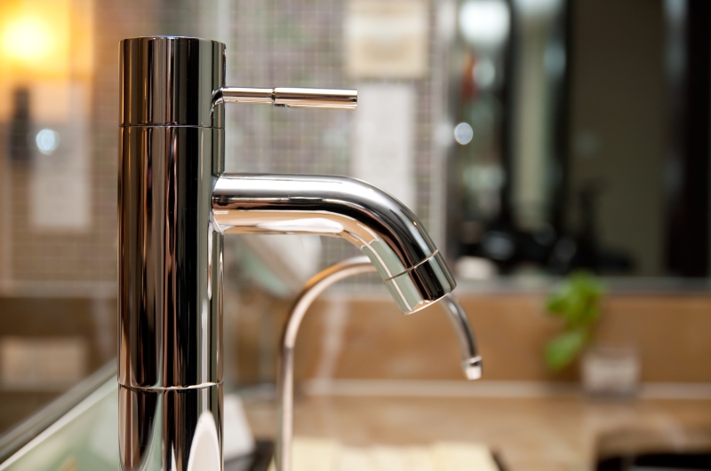 Leaking tap being repaired in Battersea
